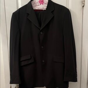 Report Collection men’s suit jacket and matching pants.
